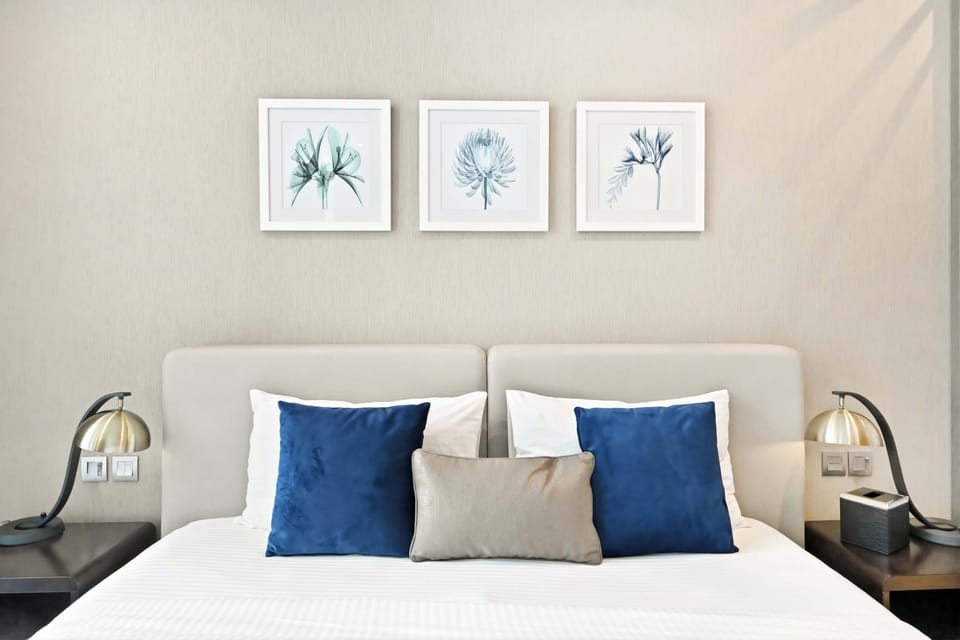 King Bed with Soft Linens & Cozy Lighting