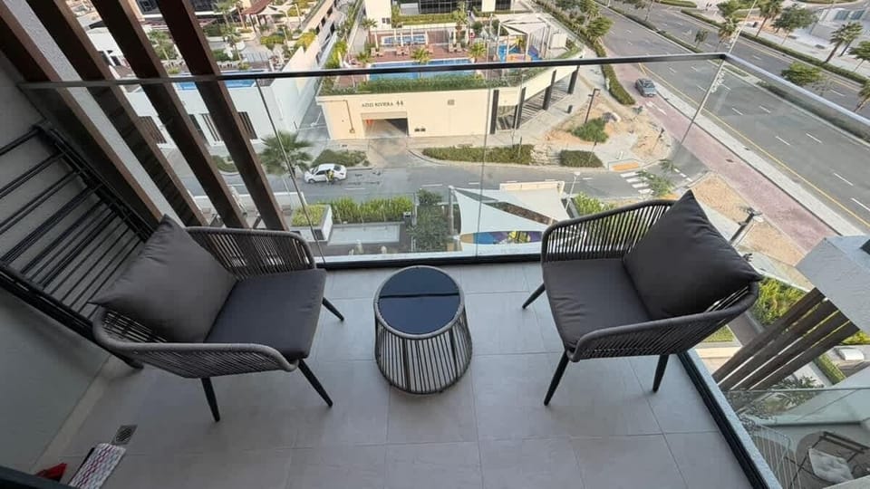 Private balcony with seating and community views