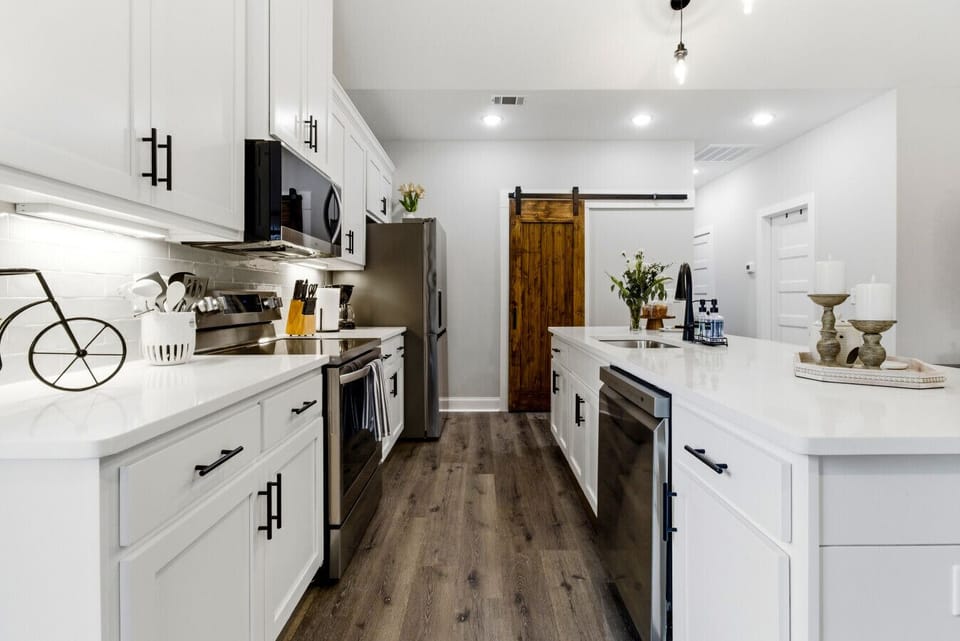 Kitchen | Quartz Countertops | Stainless Steel Range