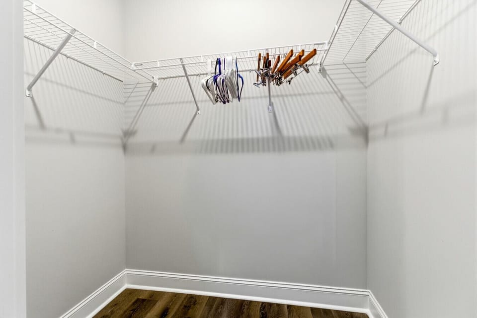 Walk-In Closet | Wire Shelving | Hanging Rods & Corner Layout