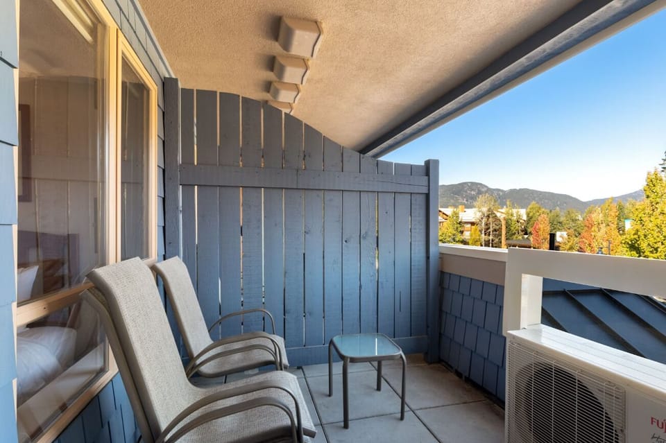 Lounge outside with a breeze and a quiet corner perch.