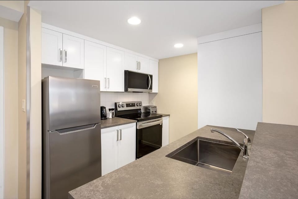 Prepare easy meals with full-size appliances and generous counterspace.