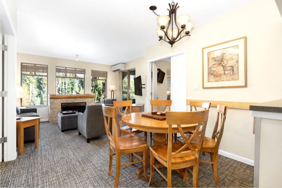 Share slow breakfasts together under warm, stylish chandelier light.