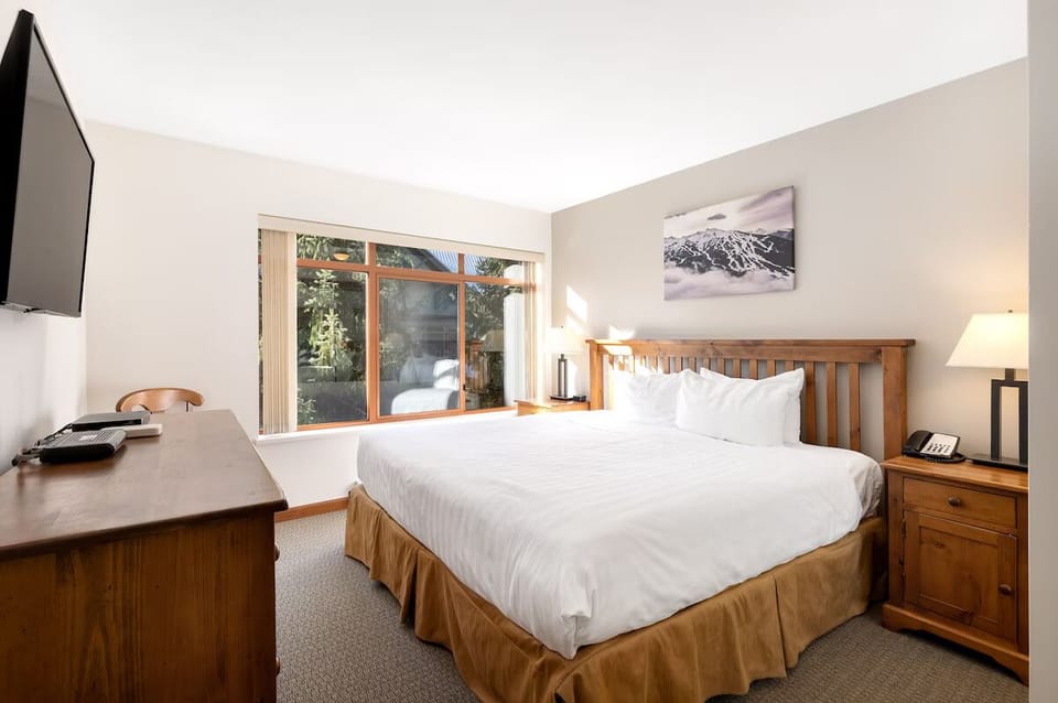 Unwind in crisp linens and restful, mountain-inspired comfort.
