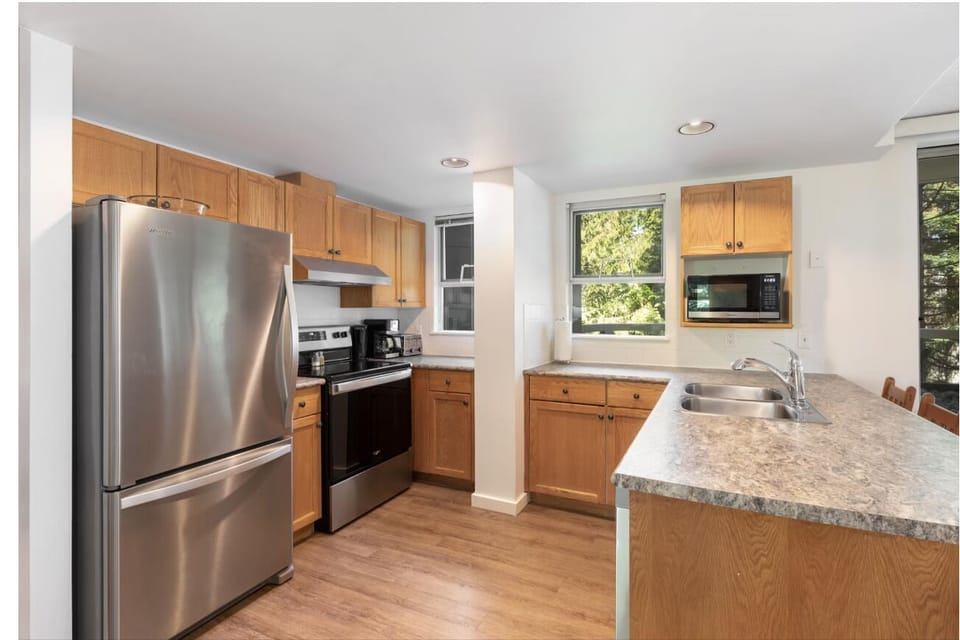 Prepare family favorites with full-size appliances and ample cabinetry.