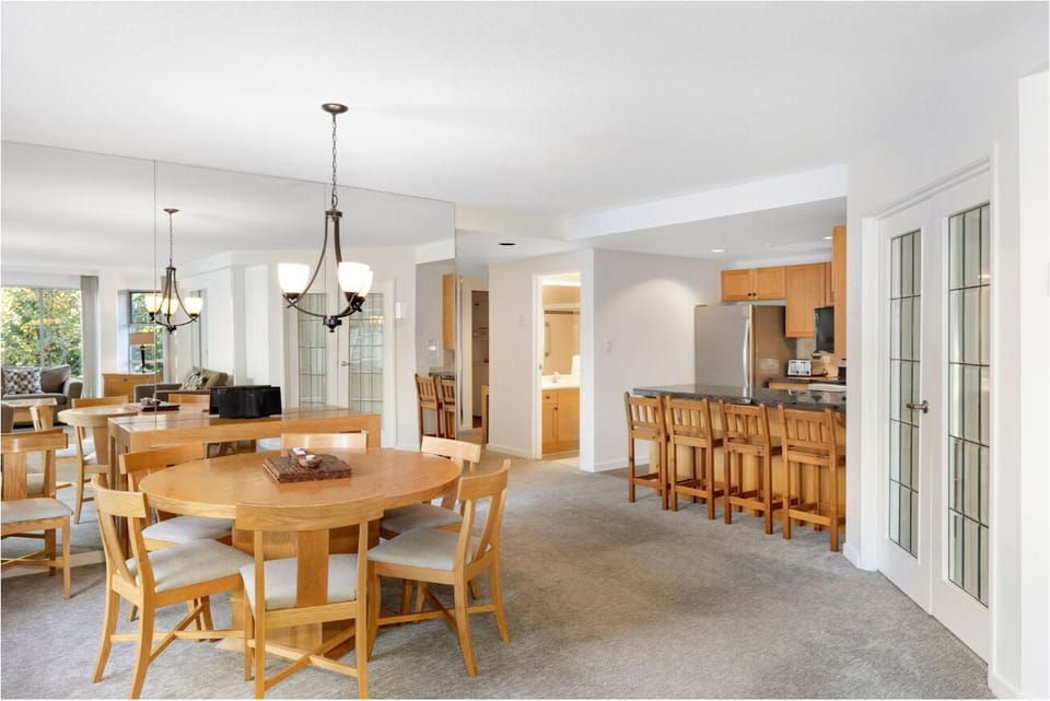 Host effortlessly with a breakfast bar and open kitchen layout.