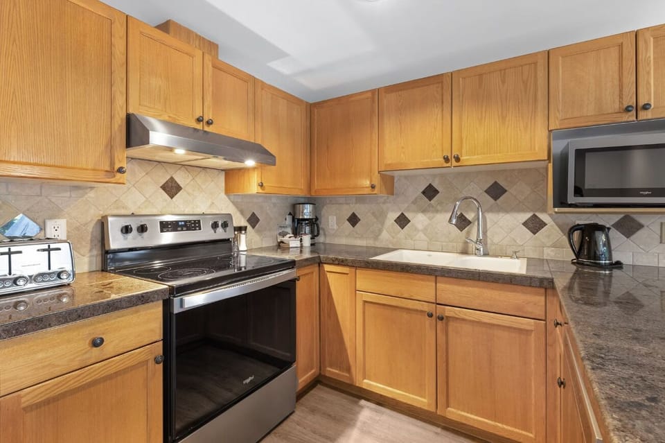 Prep delicious meals with full-size appliances and ample counterspace.