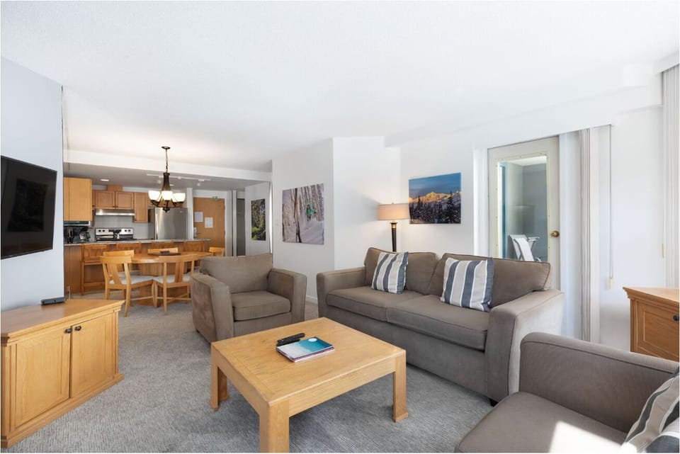 Stretch out together in the open living space and seating.