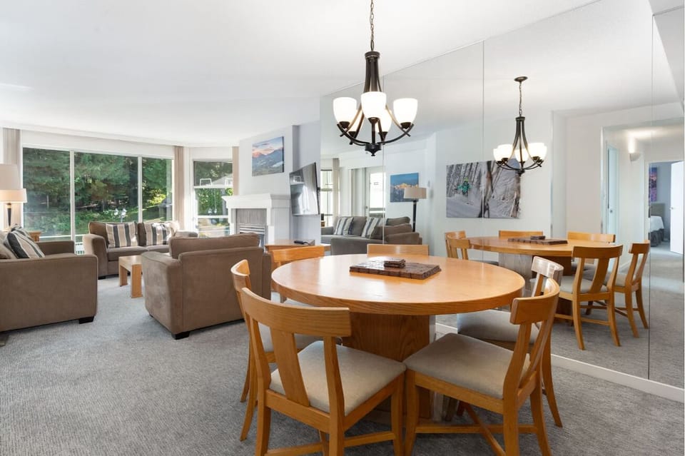Share long meals at the table with lounge views.