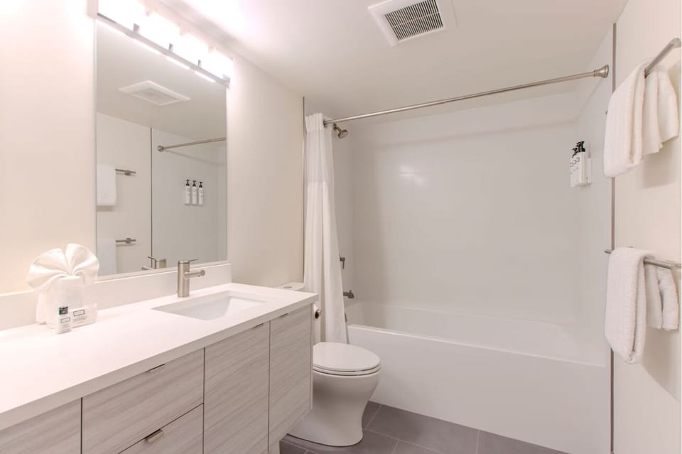 Refresh effortlessly in a bright bath with tub-shower combo.