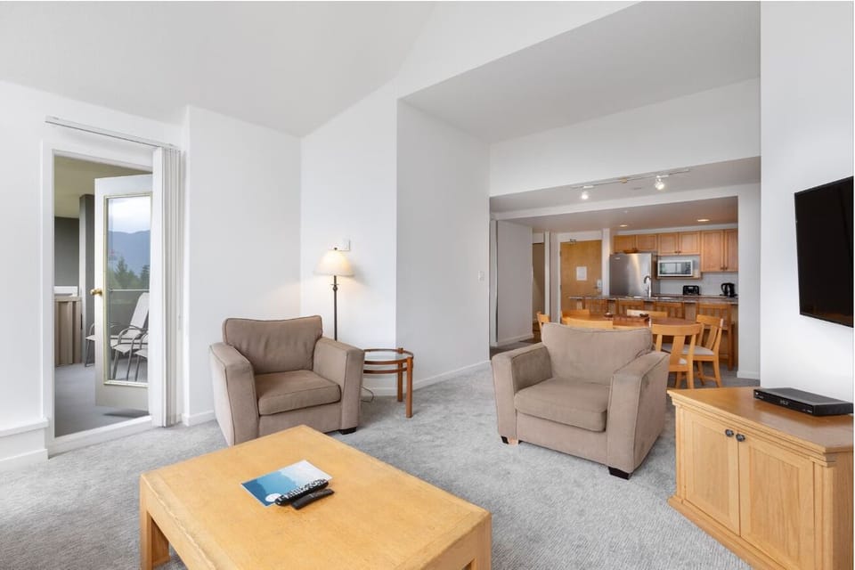 Stretch out in the airy lounge with easy kitchen access.