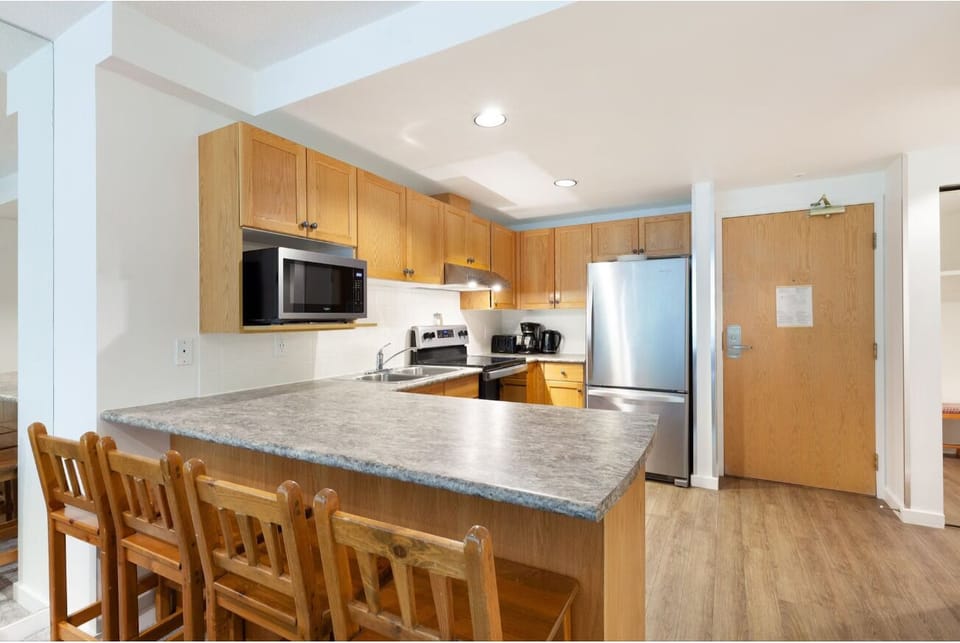 Cook and gather around the roomy breakfast bar together.