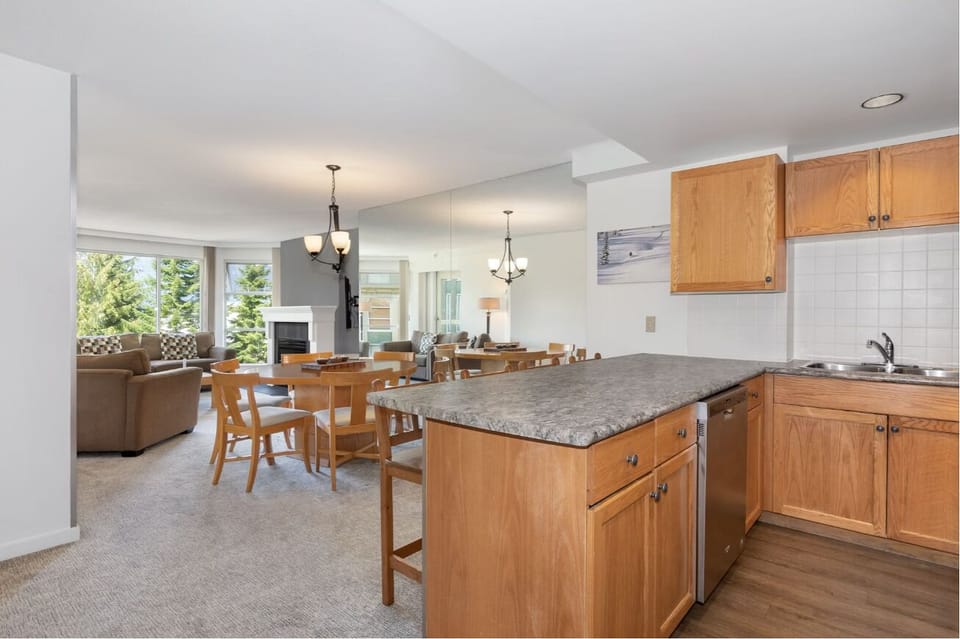 Unwind in the airy living area with open kitchen flow.