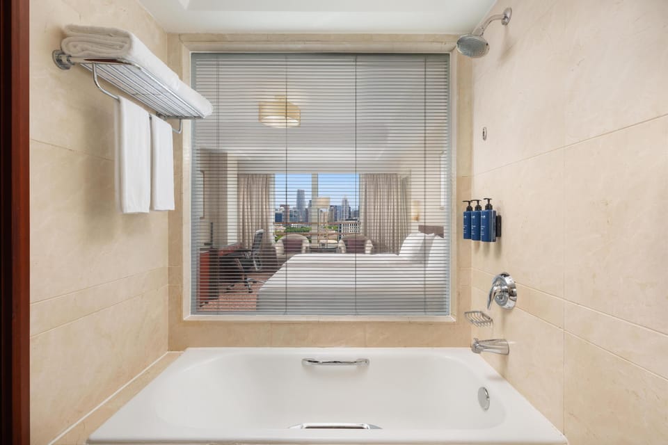 Designer toiletries, hair dryer, bathrobes, slippers