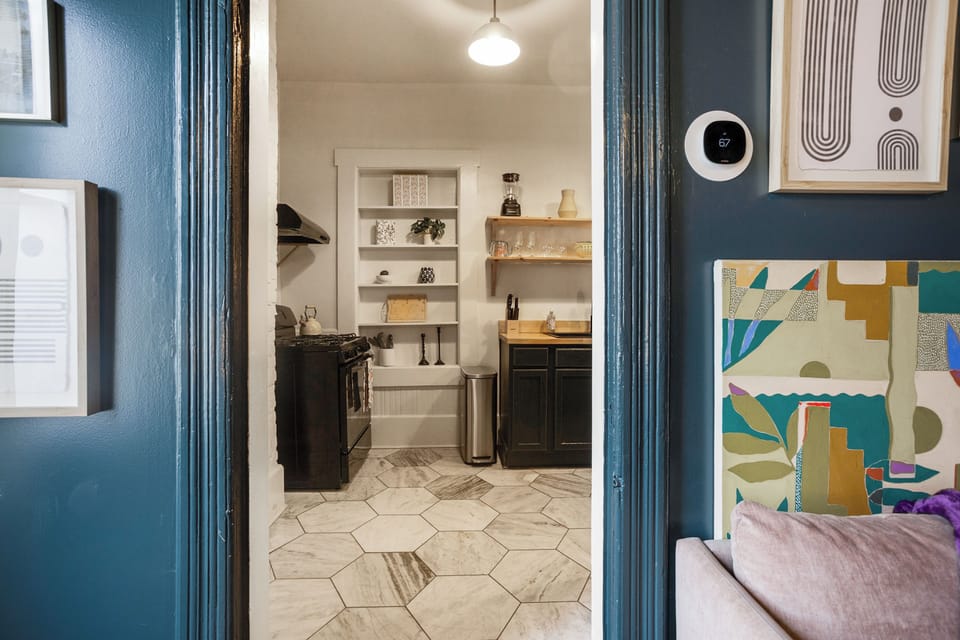 Just off the living room, the kitchen is easily accessible for cooking, snacks, or morning coffee.