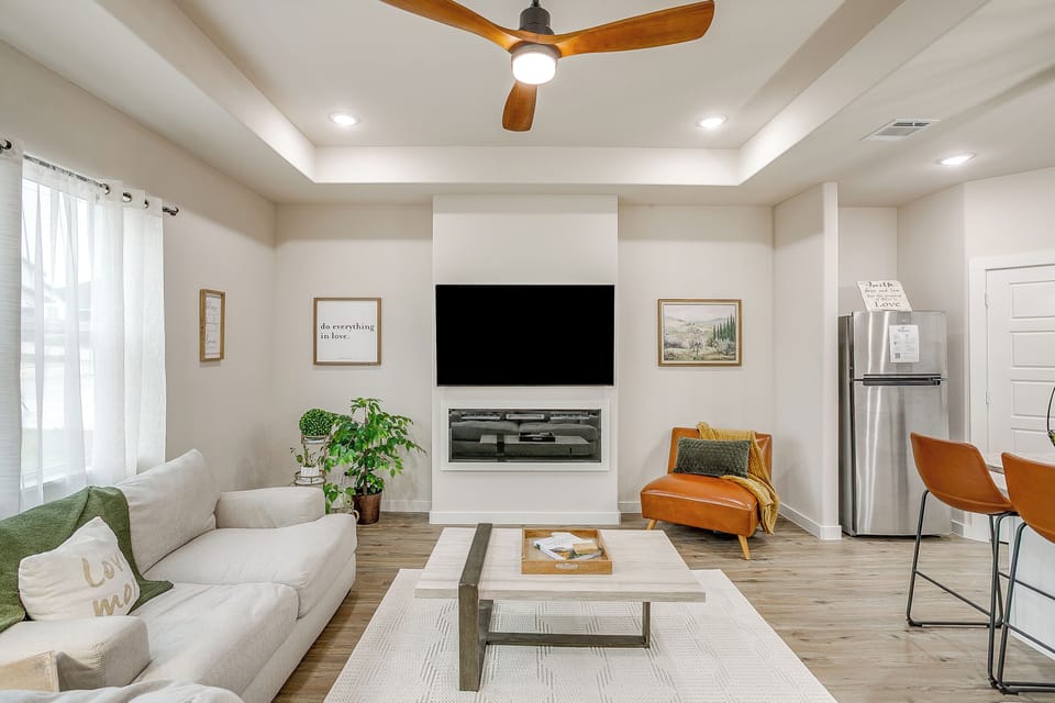 Cozy living space designed for movie nights or quiet evenings in.