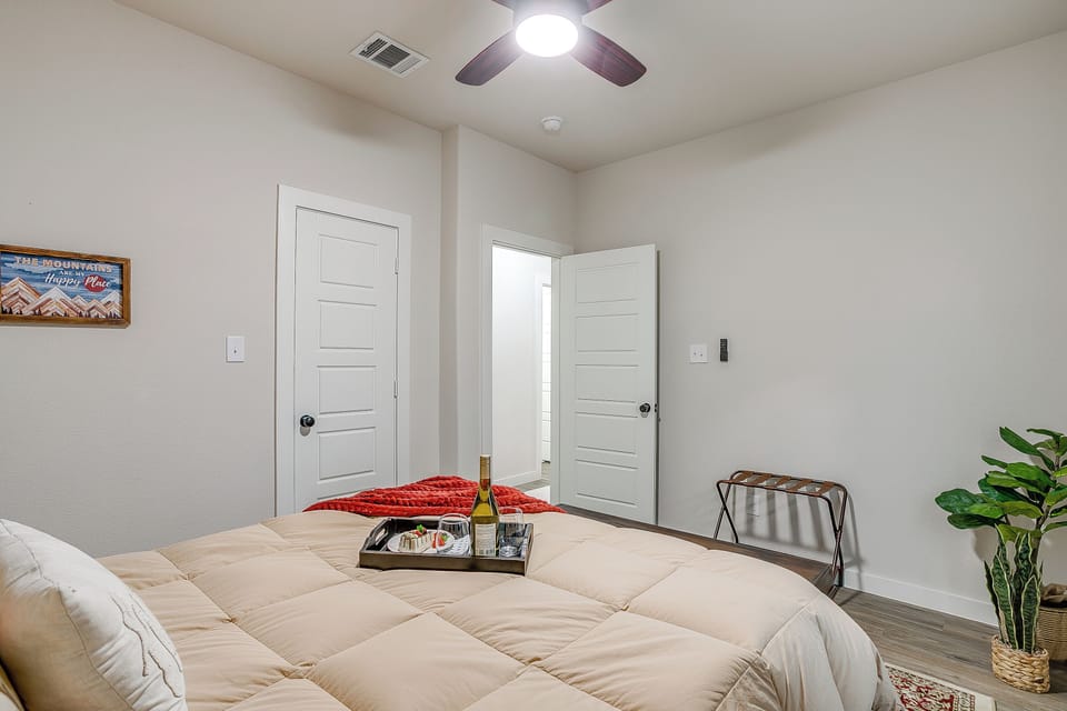 Warm and inviting bedroom ideal for guests seeking a peaceful night's sleep.