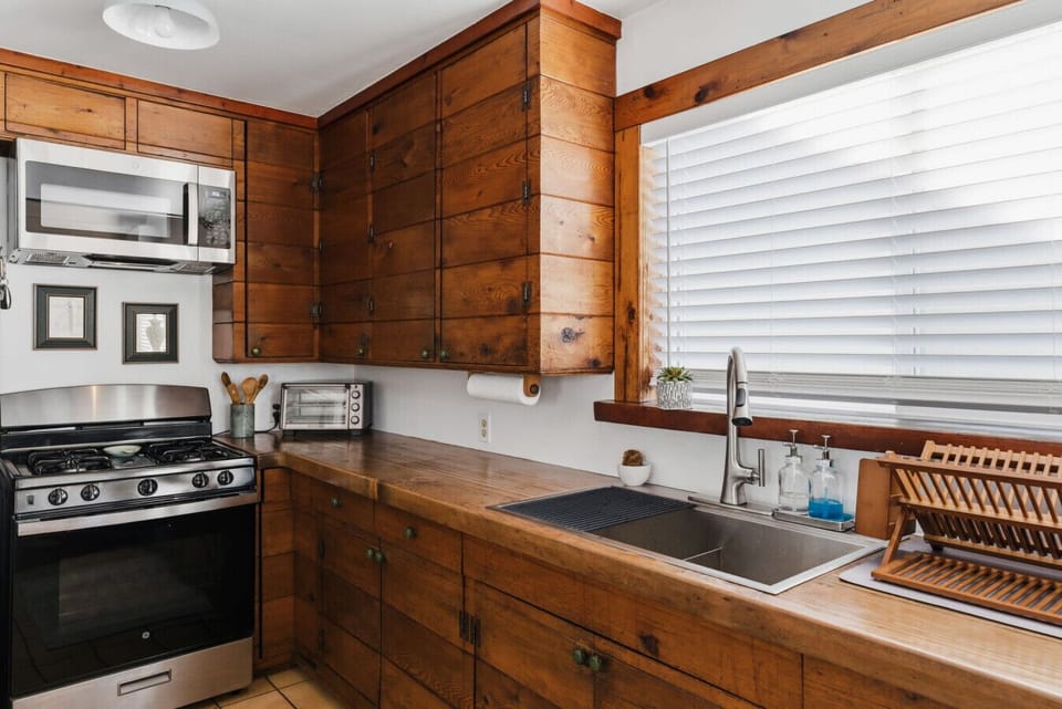 Kitchen featuring updated appliances and all your basic cooking needs