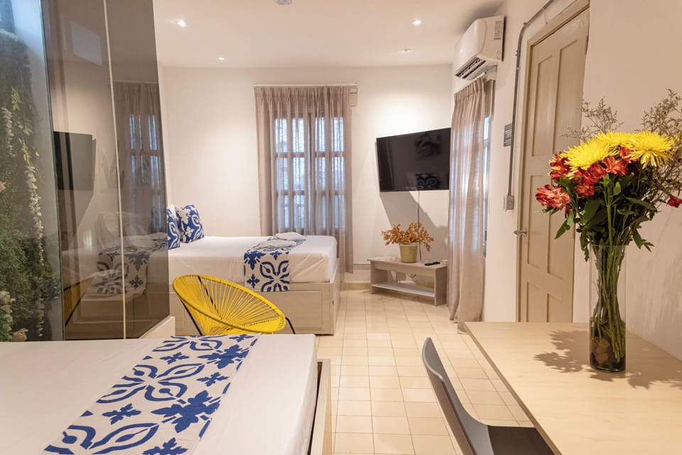 Standard Quadruple Room, Courtyard View | WiFi (free), bed sheets