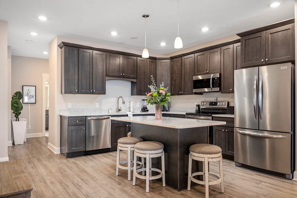 Beautiful full kitchen with island bar. Great for hosting, cooking, breakfast.
