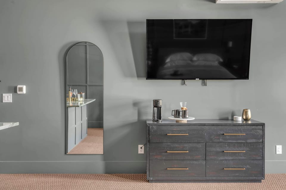 Full length mirror, TV and coffee maker