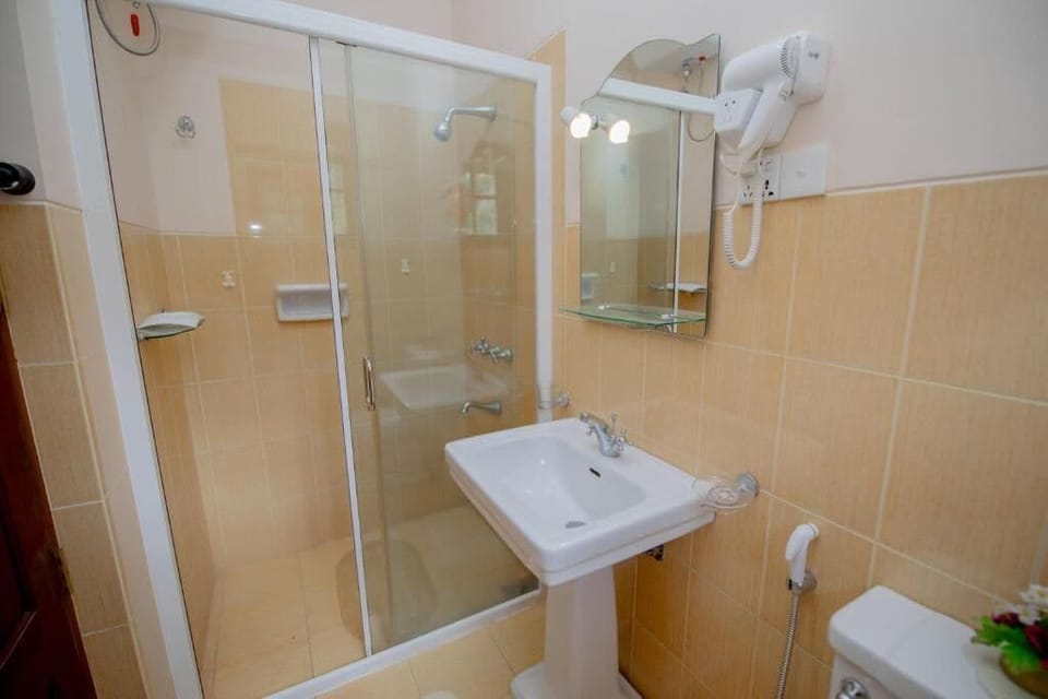 Family Suite, Balcony, Mountain View | Bathroom | Hair dryer, bidet, towels, soap