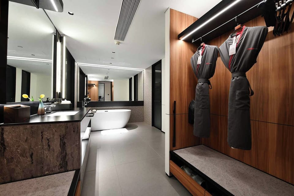 Luxury Suite, City View | Down comforters, free minibar, in-room safe, individually decorated