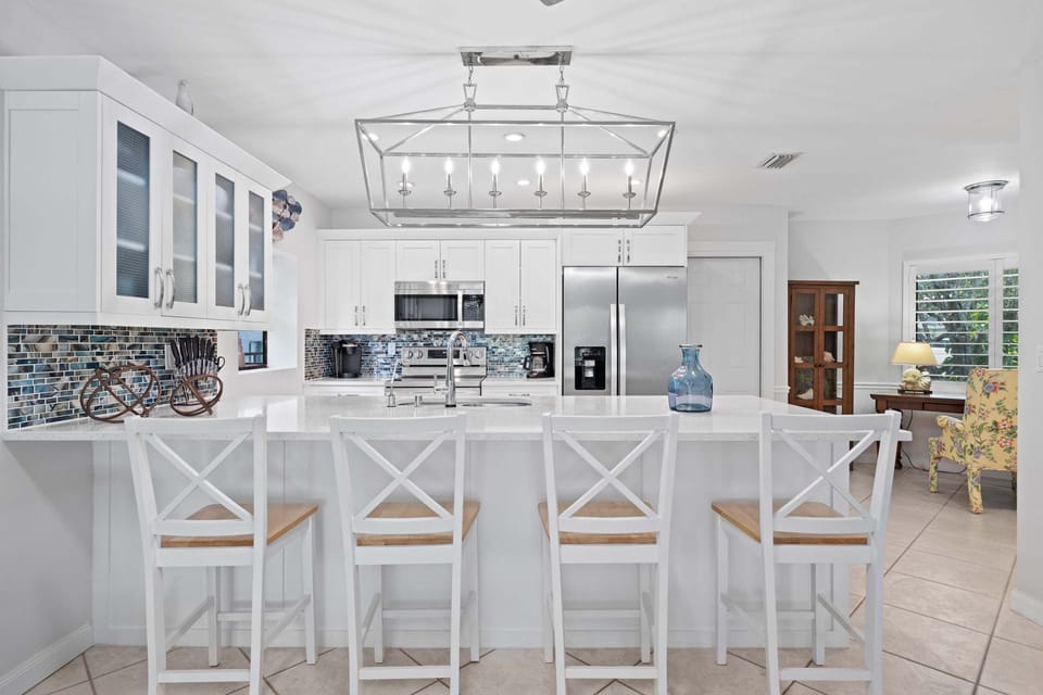 Gather, snack, and sip around the oversized island.