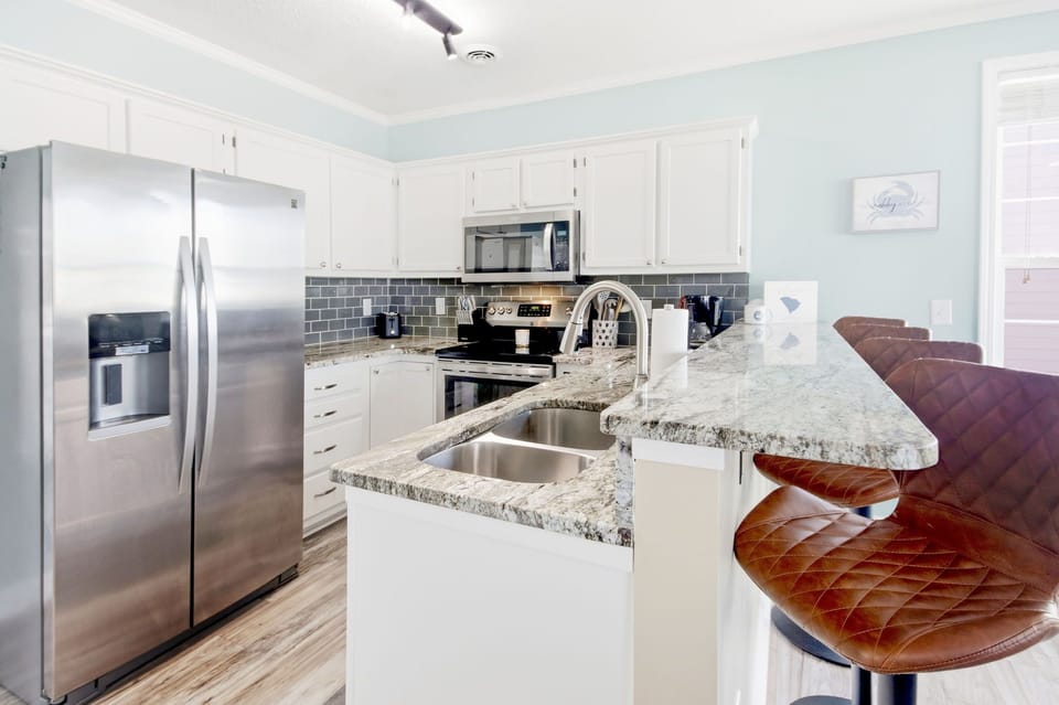 New Countertops and Refinished Cabinets