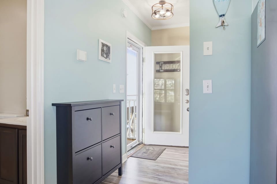 Half bath with laundry and balcony access