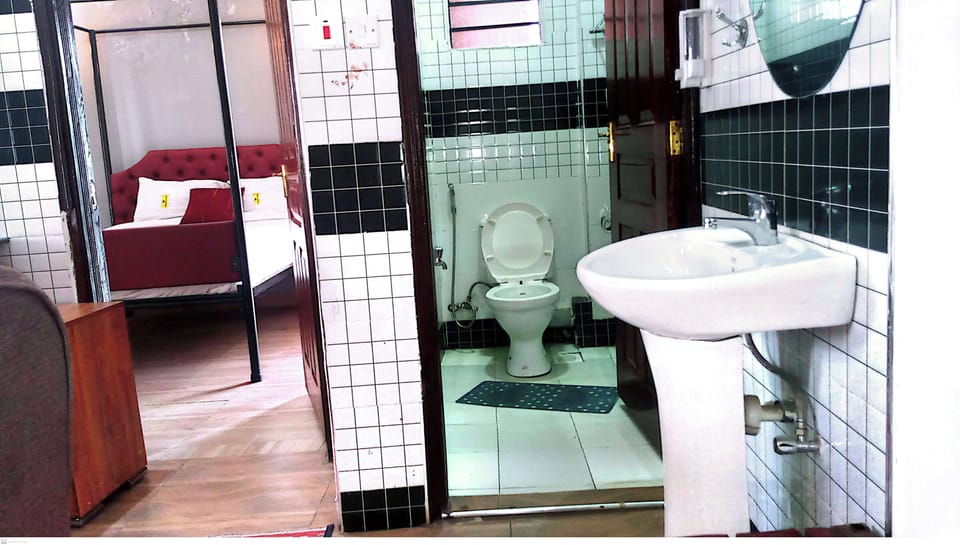 Separate tub and shower, slippers, towels, soap