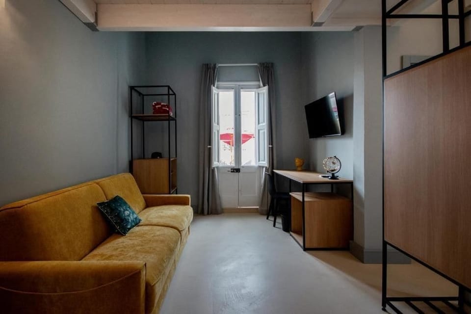 Luxury Suite | Living area | TV