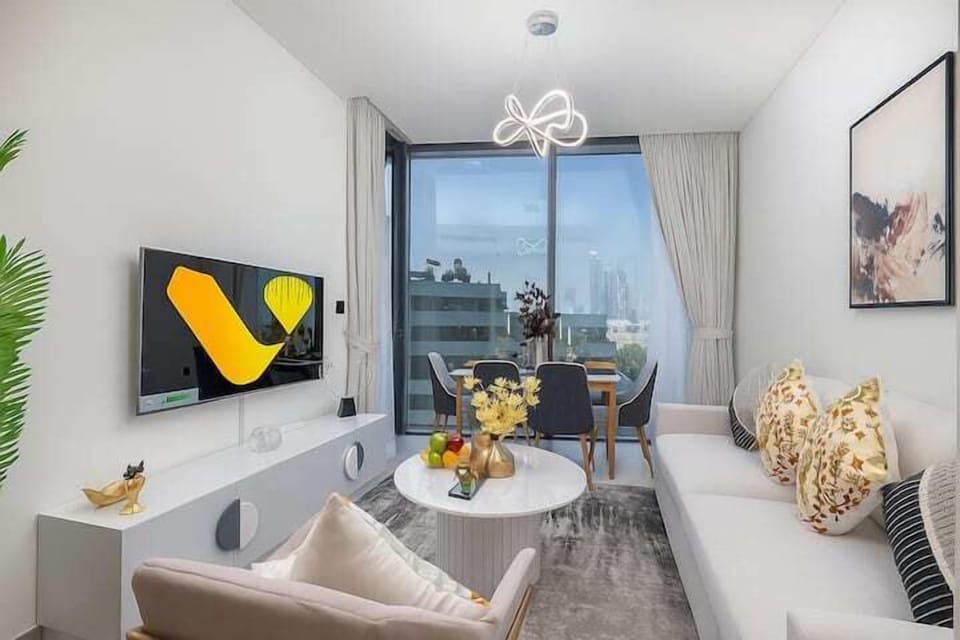 Luxury Apartment, City View | Living area | 65-inch Smart TV with cable channels