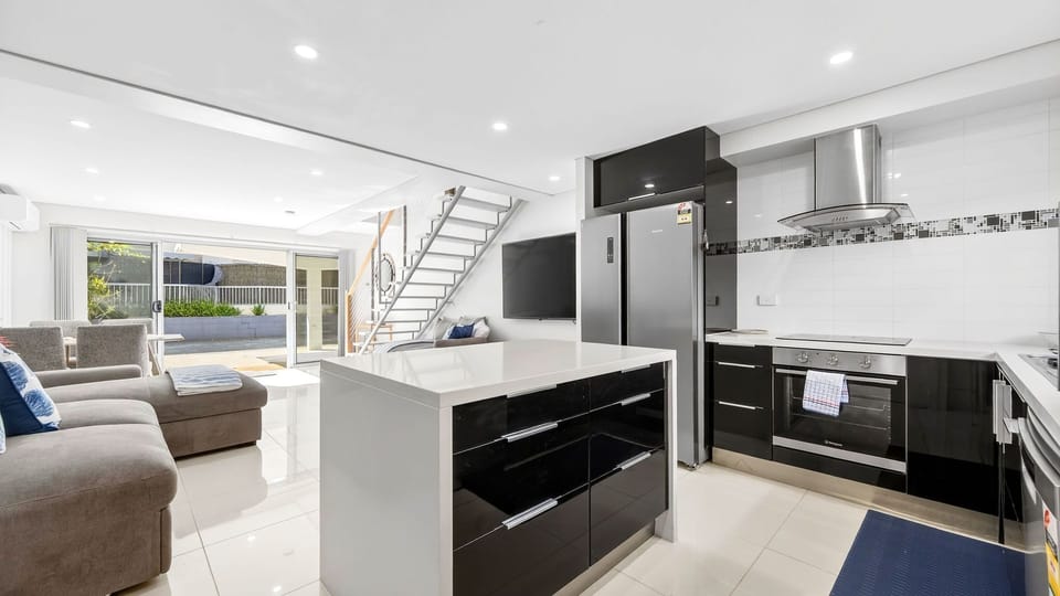 Bright kitchen overlooking the living space for easy entertaining.