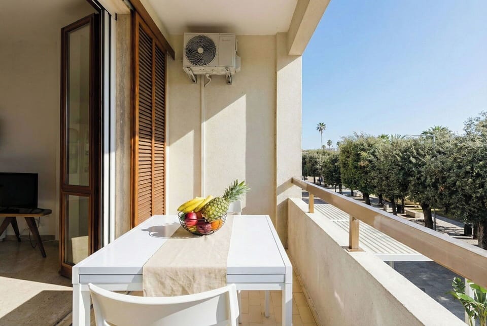 Wood, Flooring, Floor, Apartment, Wood Stain, Balcony, Shade, Chair, Hardwood, Home Door