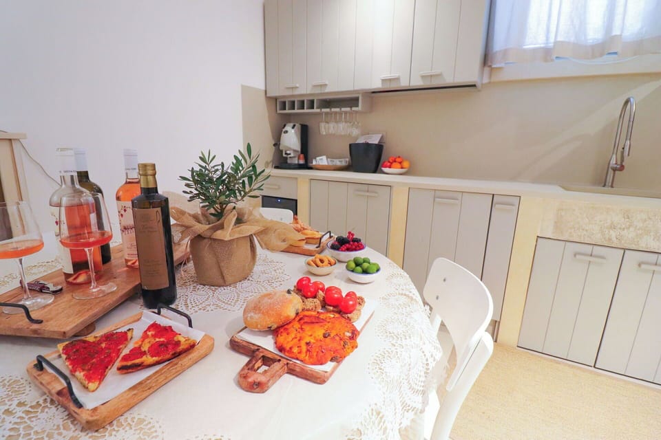 Food, Furniture, Tableware, Interior Design, Countertop, Room, Kitchen Appliance, Kitchen, Cabinetry, Chair