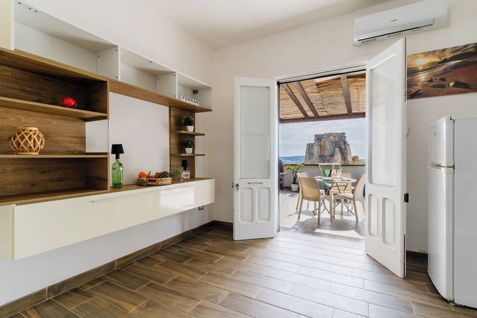 Furniture, Interior Design, Flooring, Floor, Wood, Ceiling, Wood Flooring, Room, Cabinetry, Lighting