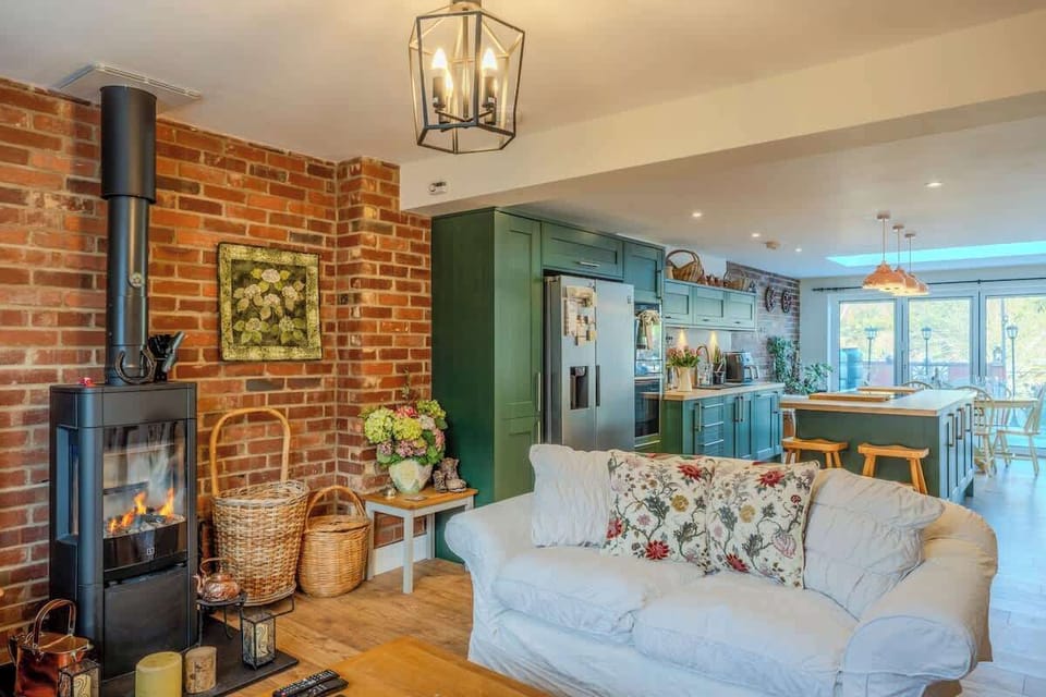 This warm and welcoming living area is ideal for spending time together, whether enjoying a quiet night in or planning the next day’s adventures