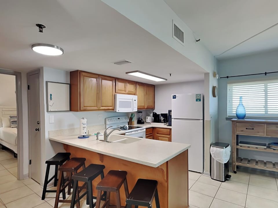 Fully Equipped Kitchen with Bar Seating