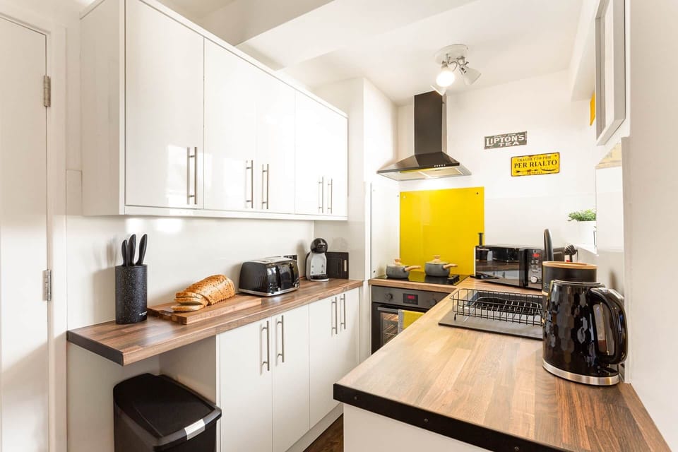 Kitchen area with fully fitted appliances and all cooking equipment for your self catering stay