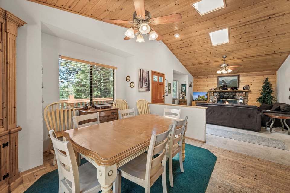 Dining Area - Dining Area with kitchen bar seating and full table and chairs with forest views