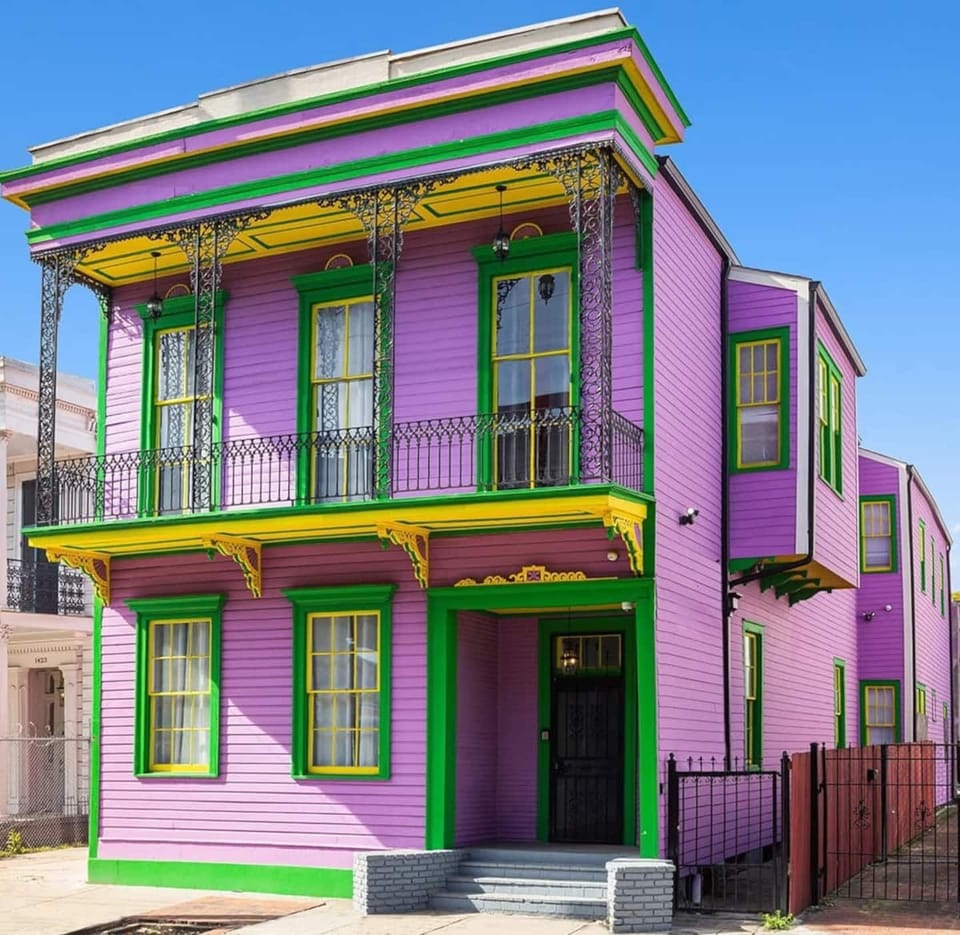 Bold, vibrant, and unmistakably New Orleans. This eye-catching Treme retreat features a private balcony, ornate ironwork, and colorful charm throughout. Walk to the French Quarter, world-class music, and top dining.