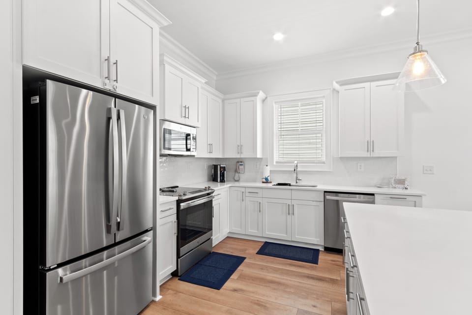 Fully equipped stainless steel kitchen.