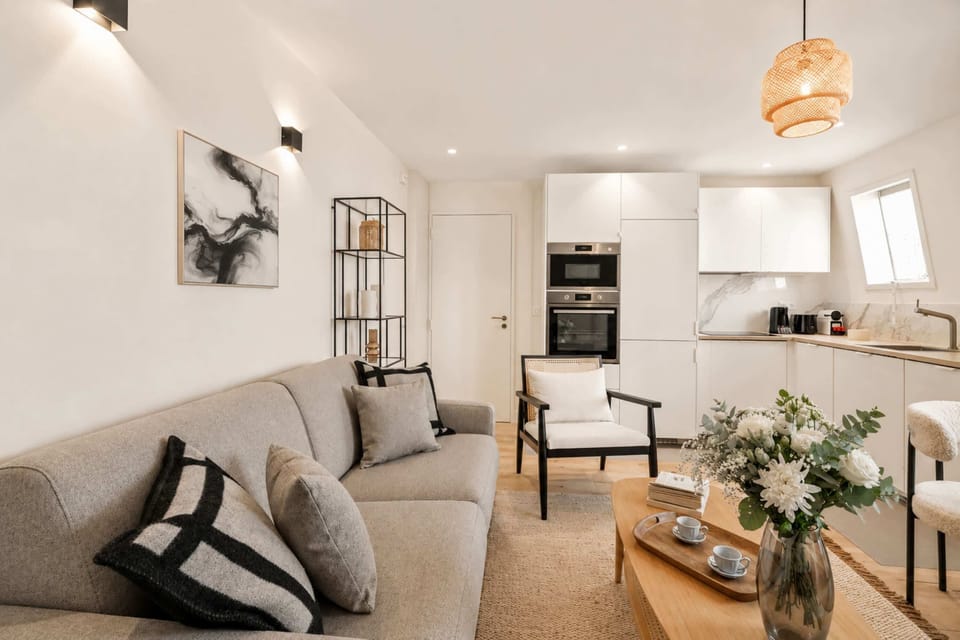 Inviting living space with a stylish dining table, perfect for cozy meals.