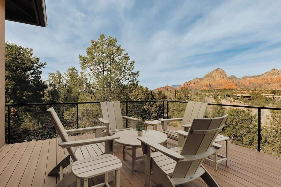 Step onto your private deck and soak in the breathtaking red rock mountain views while you relax in comfortable outdoor seating.