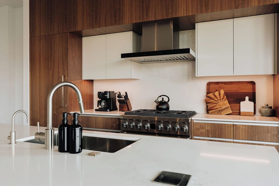 Sleek modern kitchen with premium appliances where you'll craft memorable meals during your stay.