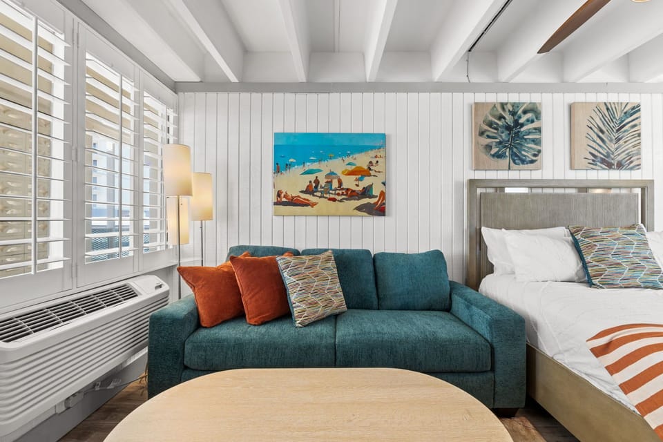 Living Room with Queen Bed and Queen Sleeper Sofa