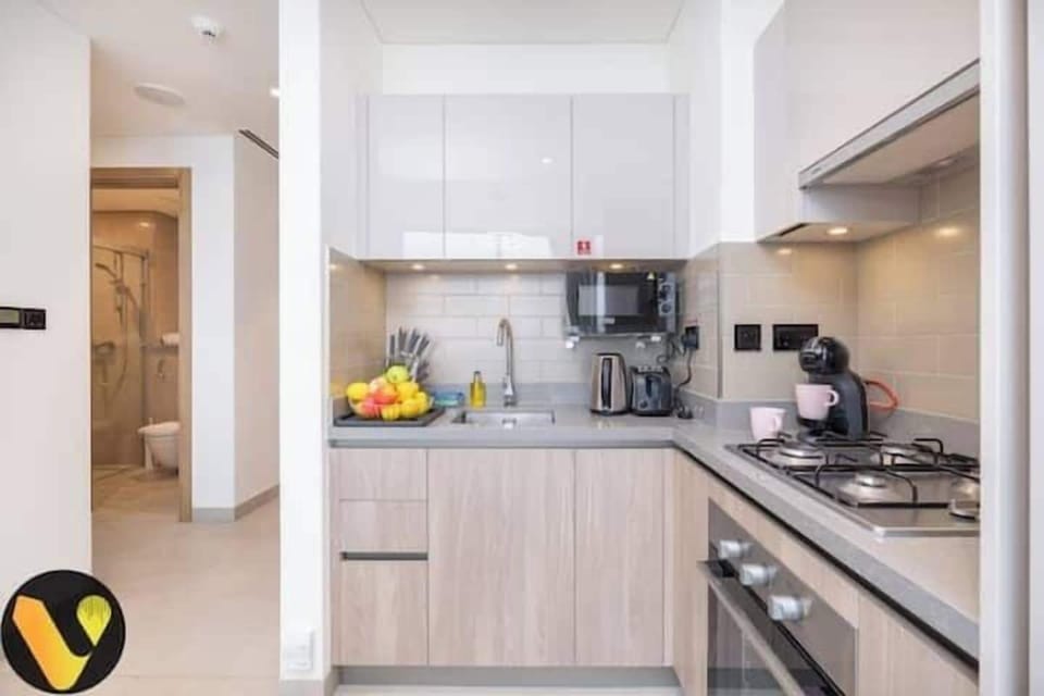 Luxury Apartment, Balcony, City View | Private kitchen | Full-size fridge, microwave, oven, stovetop