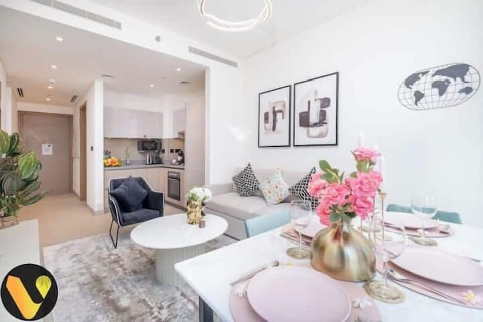 Luxury Apartment, Balcony, City View | Living area | 65-inch Smart TV with cable channels