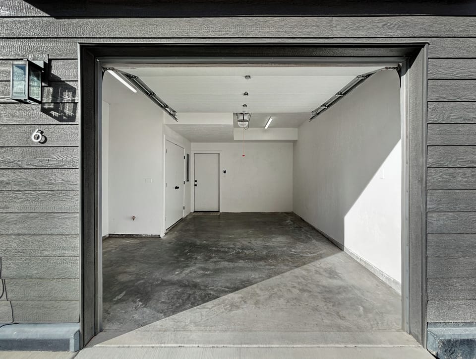 A spacious garage provides secure parking for your vehicles and storage needs during your stay.
